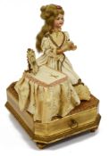 An early 20th century French bisque head doll automaton