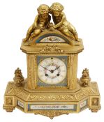 A late 19th French Louis XVI style ormolu mounted Sevres style porcelain mantle clock