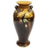 An early 20th century twin handled vase