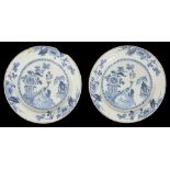 A pair of late 18th century English Delft plates dated 1776
