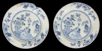 A pair of late 18th century English Delft plates dated 1776