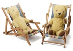 A delightful pair of vintage miniature beech wood deck chairs