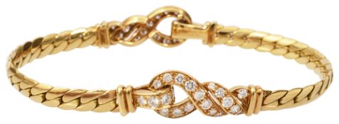 A diamond-set and 18ct yellow gold 'Love Knot' bracelet by Cartier