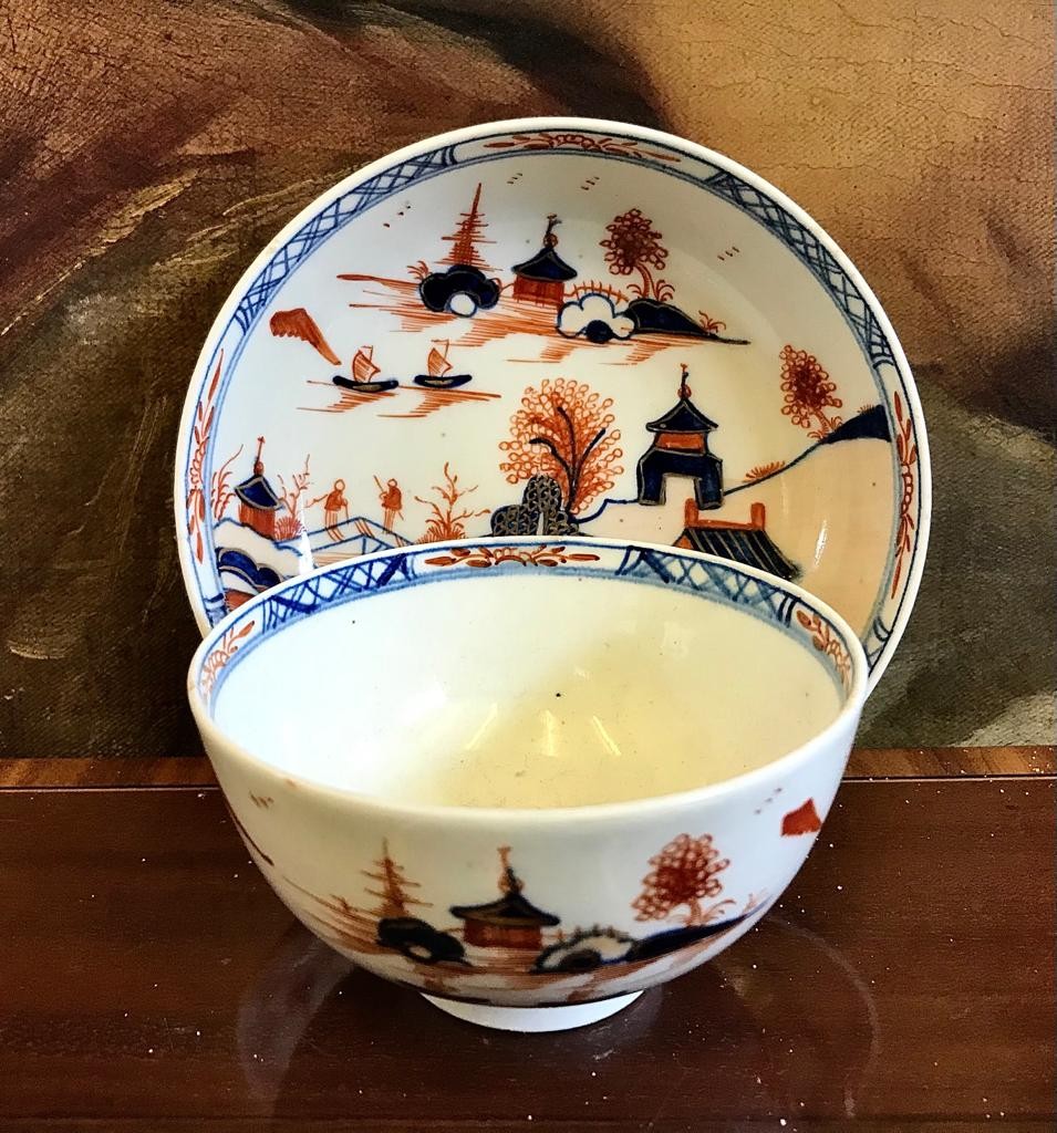 EARLY 19th CENTURY LIVERPOOL TEA BOWL AND SAUCER, POLYCHROME DECORATION