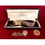 SILVER COLOURED RECTANGULAR WATCH BY BENSON, LONDON (AT FAULT) PLUS SILVER COLOURED HEART LOCKET AND