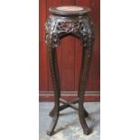 19th century Oriental heavily carved and pierce work decorated plant stand, with marble insert to