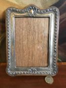 SILVER REPOUSSE PHOTOGRAPH FRAME WITH GLASS, BIRMINGHAM 1908, GLASS SIZE APPROXIMATELY 14 x 9.5cm