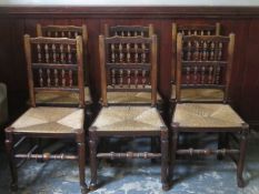 Set of six 19th century oak rush seated ladder back chairs, on stretchered supports. Approx. 94cms H