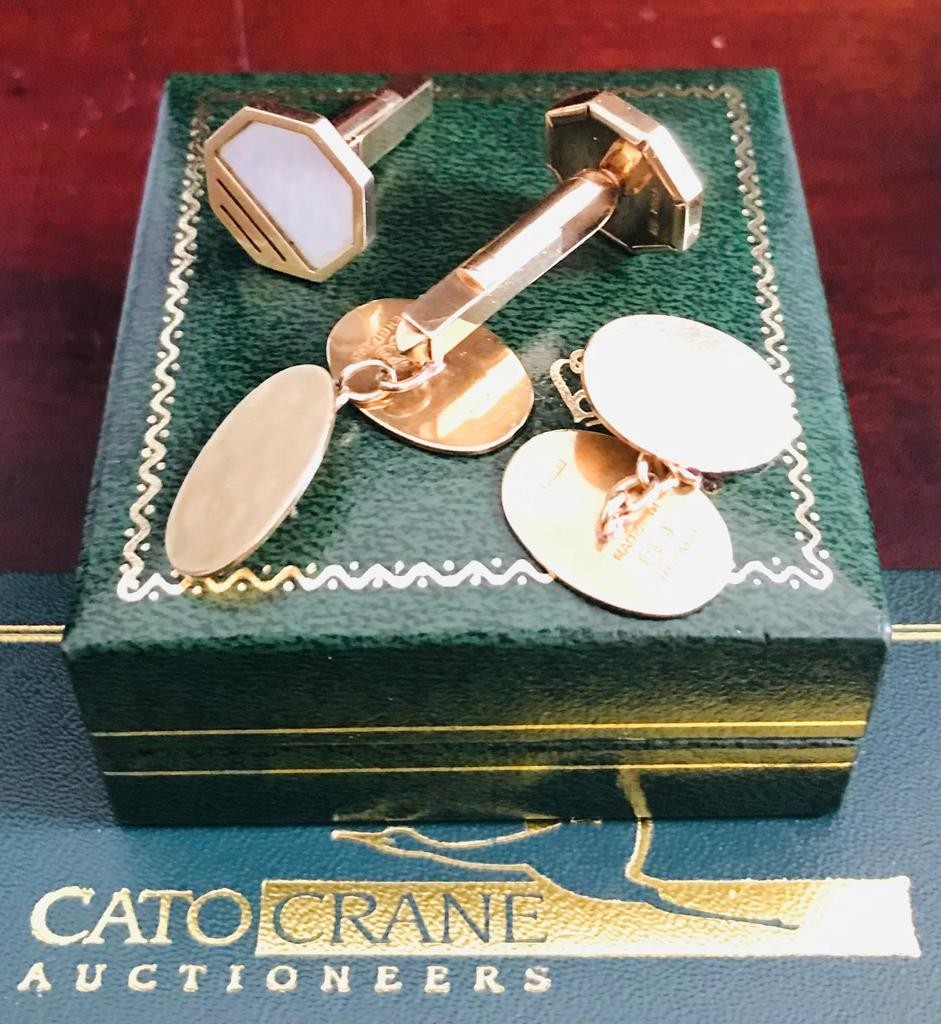 Two pairs of 9ct gold cufflinks, one set with mother of pearl. Gross weight Approx. 17.6g