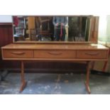 Mid 20th century G Plan style teak mirror backed dressing table. Approx. 116cms H x 153.5cms W x