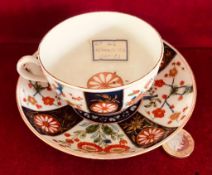 18th CENTURY WORCESTER CUP AND SAUCER, DAISY/MARIGOLD FLOWER TO CUP INTERIOR, CIRCA 1760