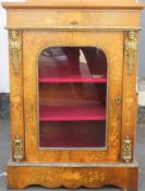 19th century walnut veneered single door glazed pier cabinet, highly decorated with marquetry