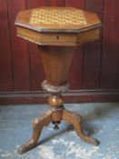 19th century mahogany inlaid chess top table, with fitted interior, on carved tripod supports.