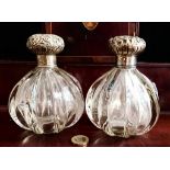 PAIR OF RIBBED GLASS SCENT BOTTLES WITH SILVER CAPS, PROBABLY BIRMINGHAM 1904, APPROXIMATELY 14cm