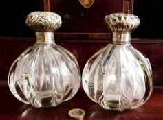 PAIR OF RIBBED GLASS SCENT BOTTLES WITH SILVER CAPS, PROBABLY BIRMINGHAM 1904, APPROXIMATELY 14cm