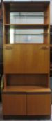 G Plan mid 20th century teak wall unit with cupboard doors below. Approx. 190cms H x 46cms D x 46cms