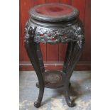 Heavily carved oriental hardwood two tier plant stand. Approx. 76cms H x 41cms D