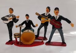 Four Beatles style 1960?s plastic toy figures condition poor