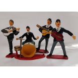 Four Beatles style 1960?s plastic toy figures condition poor