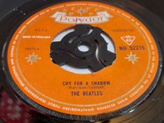 The Beatles Cry For A Shadow orange Polydor single NH52275 centre has been pushed out