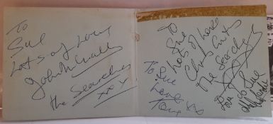 Searchers autographs on page from autograph book an promo card (clipped)