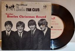 1964 Beatles Fan Club Record sleeve has a rip in it.