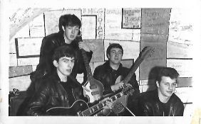 The Beatles with Pete Best at the Cavern Club Liverpool 1962 photograph. The item is formerly the