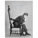 Astrid Kirchherr photograph of George Harrison sold at NEMS Liverpool signature on the front is by