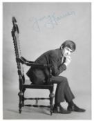 Astrid Kirchherr photograph of George Harrison sold at NEMS Liverpool signature on the front is by