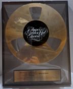 Ampex Golden Reel Award presented to Geoff Emerick for work on Paul McCartney?s Pipes Of Peace LP