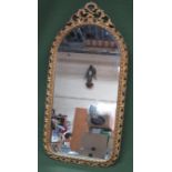 20th century gilt metal framed wall mirror. Approx. 74cms x 37cms