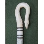 18th century speckled whale bone turned walking stick, with hand carved ivory serpent form handle.