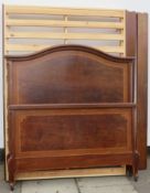 Double bed frame with inlaid mahogany bed ends. Approximately. 193.5cm L x 144cm W