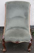 Victorian carved mahogany framed button back upholstered nursing chair. Approx. 92cms H x 56cms W