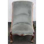 Victorian carved mahogany framed button back upholstered nursing chair. Approx. 92cms H x 56cms W