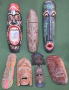 Parcel of various treen tribal style wall plaques and other tribal style carvings