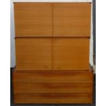 Pair of mid 20th century teak and melamine two door cupboards, plus similar chest