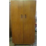 Mid 20th century teak two door wardrobe, Bearing a makers label 'BDS'. Approx. 179cms H x 91cms W