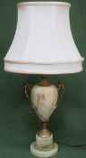 Early 20th century gilt metal and onyx effect two handled table lamp with shade. Approx. 61cms high