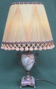 Early 20th century gilt metal and onyx effect table lamp with shade. Approx. 59cms high