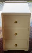 Small painted three drawer bedroom chest. App. 60cm H x 36.5cm W x 46cm D