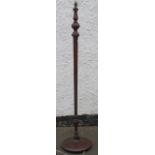 Mahogany standard lamp.