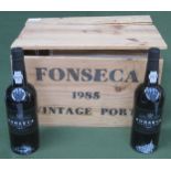 Wooden crate containing Twelve unopened bottles of Fonseca Guimaraens 1985 vintage port