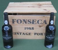 Wooden crate containing Twelve unopened bottles of Fonseca Guimaraens 1985 vintage port