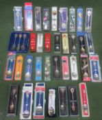 Collection of boxed vintage enamelled and other souvenir collectors spoons, relating to various