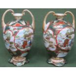 Pair of handplanted and gilded two handled ceramic vases., with panels depicting oriental scenes.