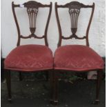 Pair of late 19th / early 20th century piercework decorated mahogany bedroom chairs. Approx. 89cms H