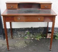 Late 19th / early 20th century mahogany inlaid three drawer writing desk with leather insert.