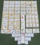 Large quantity of various unused surgical steel belly button bars, various styles and designs,