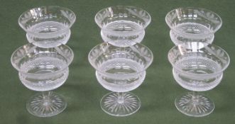 Set of six Edinburgh crystal etched thistle pattern stemmed dessert glasses. Approx. 10.5cm High